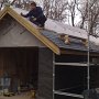 Larch clad, slate roofed garage